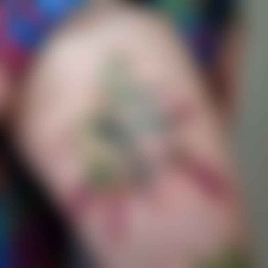 Close-up of a weed leaf tattoo on human skin